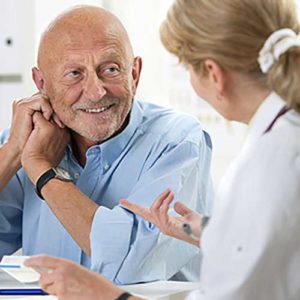 Man consulting with dentist