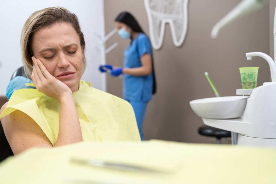 Emergency dental care at Elite Dental of Highland in Highland, IN, for a patient in pain.